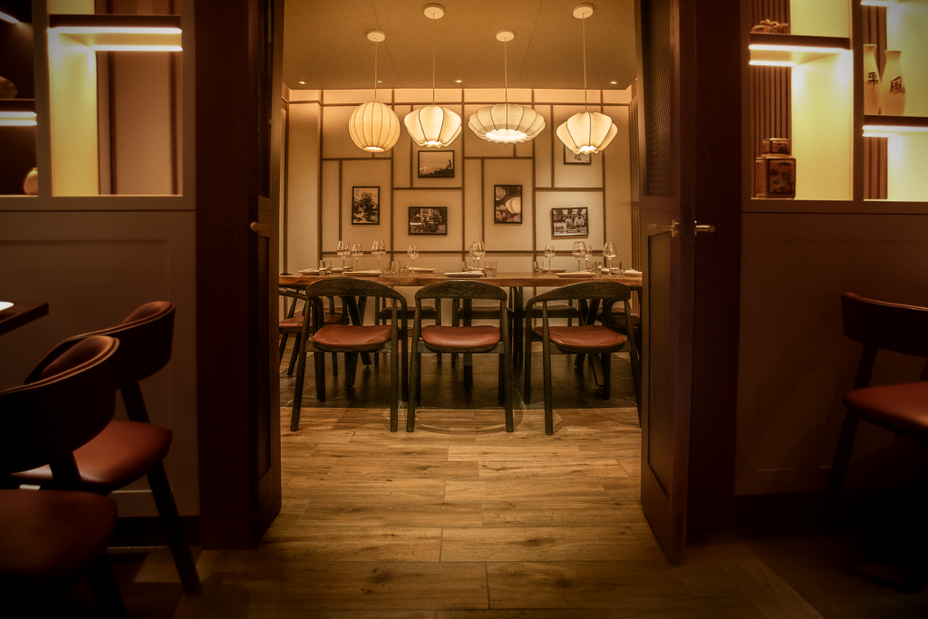 Interior of OKA Restaurant showcasing sushi and Pan-Asian dishes in a Japanese restaurant-style setting